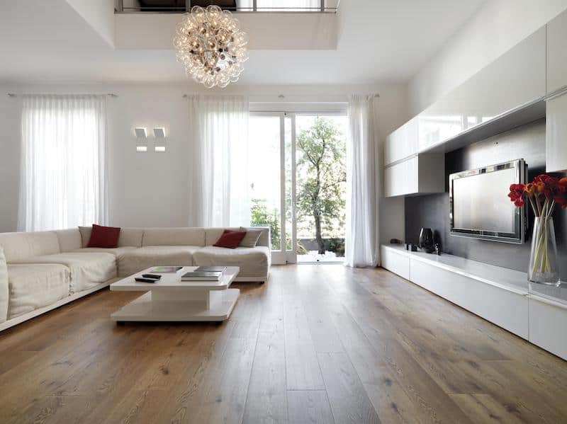 a living room that has engineered wood oak floors