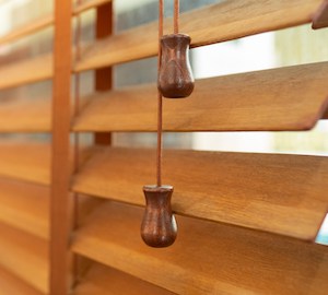 A close up of wooden blinds
