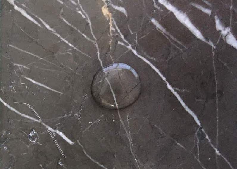 Dark marble test for durability with natural eco friendly sealers