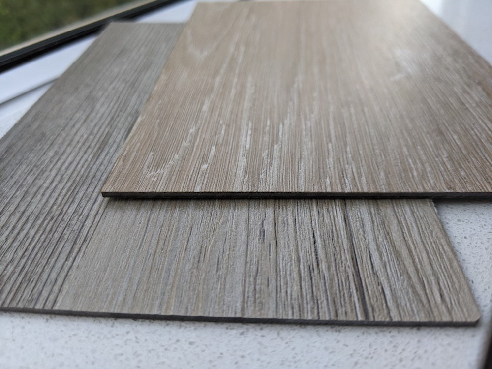 A close up of vinyl plank flooring that is very low in odor